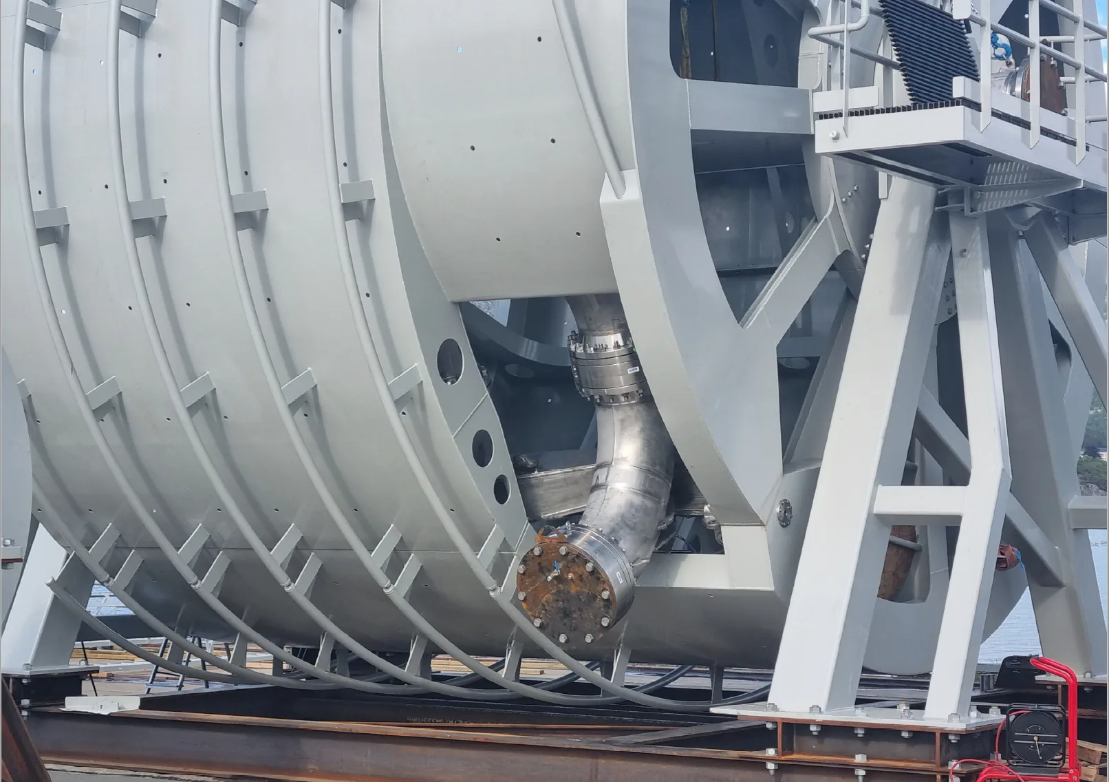 Swivel joint on a large hose reel on a ship's deck