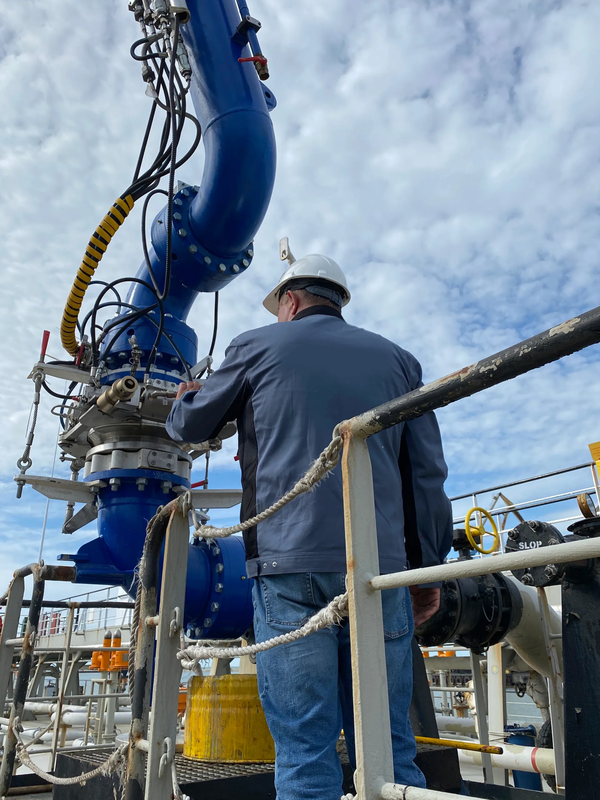 Technician at a marine loading arm