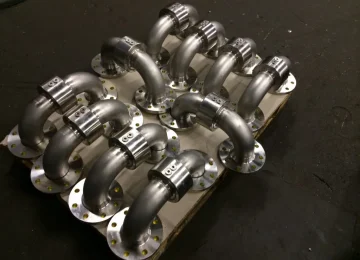 Several ATN stainless steel swivel joint elbows