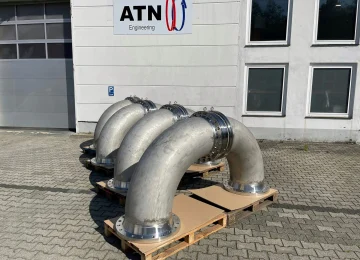 ATN swivel joint elbows in front of the ATN building