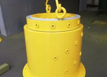 Yellow-painted ATN rotary union on a crane hook