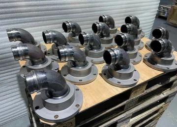 ATN swivel joint elbows with flanges on a pallet