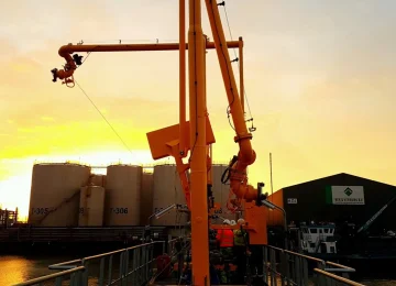 Loading arm at sunset