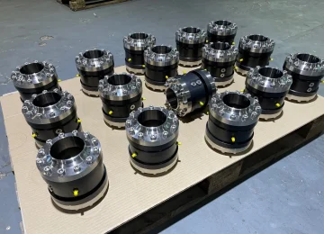 Black ATN swivel joints on a pallet